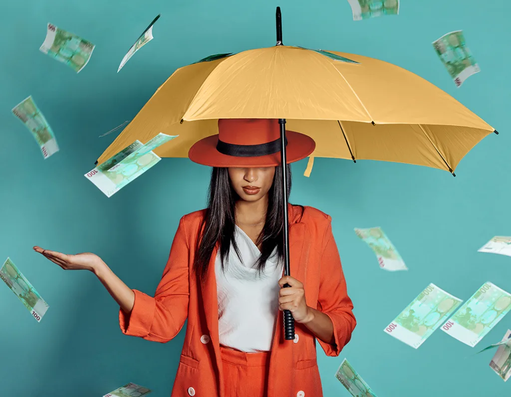Money, fashion and rich lady being showered by cash while holdin